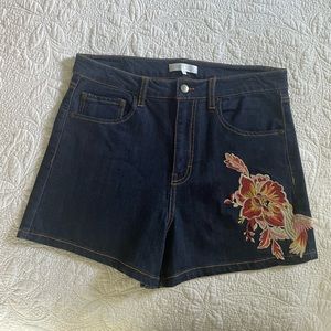 Denim shorts with flower patch
